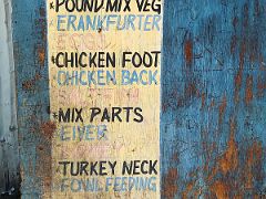 07D Sign outside a shop selling Frankfurter, Eggs, Chicken Foot, Liver, Kidney, Turkey Neck on 2nd Street Trench Town Kingston Jamaica